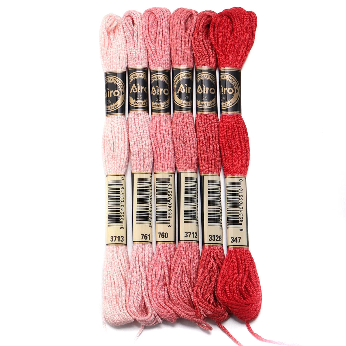 A set of six skeins of vibrant embroidery thread in various shades of pink and red for cross stitch and DIY crafts