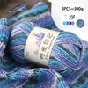 A ball of purple and blue gradient acrylic yarn is shown next to a label indicating it is 13 gauge.