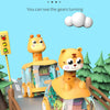 A yellow animal press gear car toy featuring a tiger character, displayed on a wooden track.