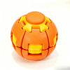 Orange and yellow burger-shaped stress relief toy with a spinning mechanism.