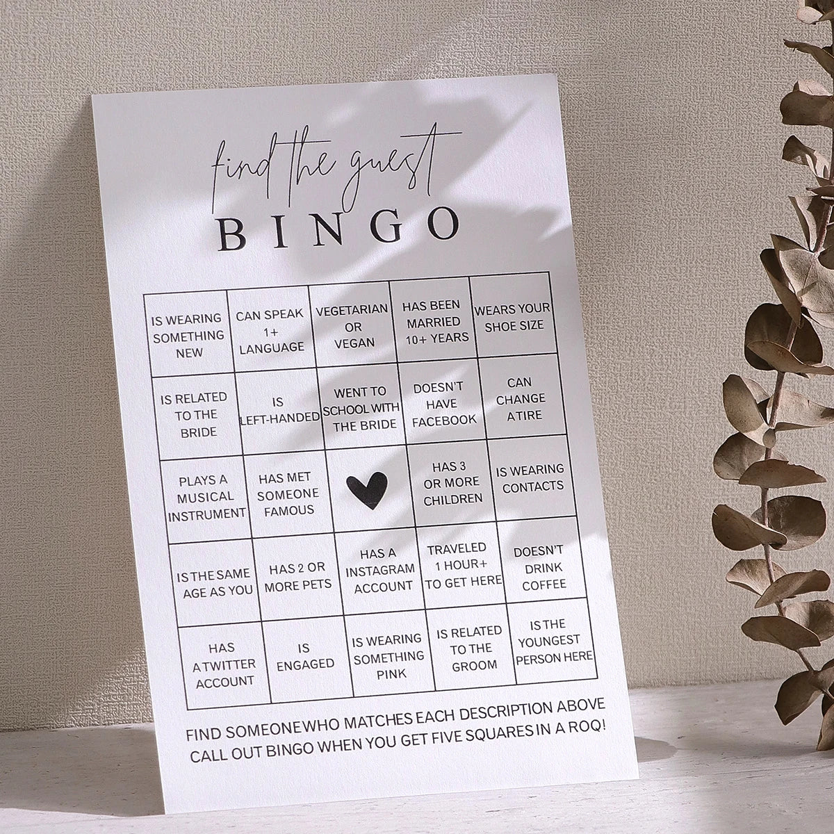 A bingo card titled Find the Guest Bingo game with various descriptions for guests