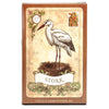 A vintage Lenormand fortune-telling card featuring a stork illustration and the name Stork on a brown background.