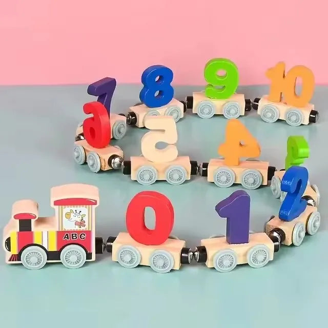 A set of magnetic wooden number train cars showing numbers 1 through 10 in various colors.