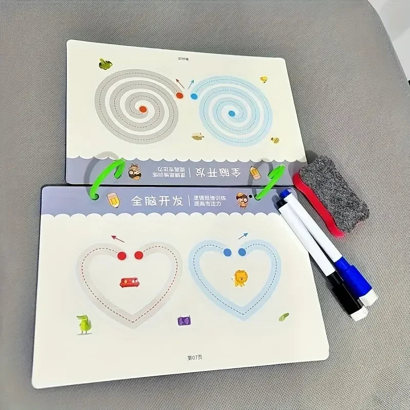 A set of reusable magic drawing workbook pages featuring swirling designs and pens on a gray surface.