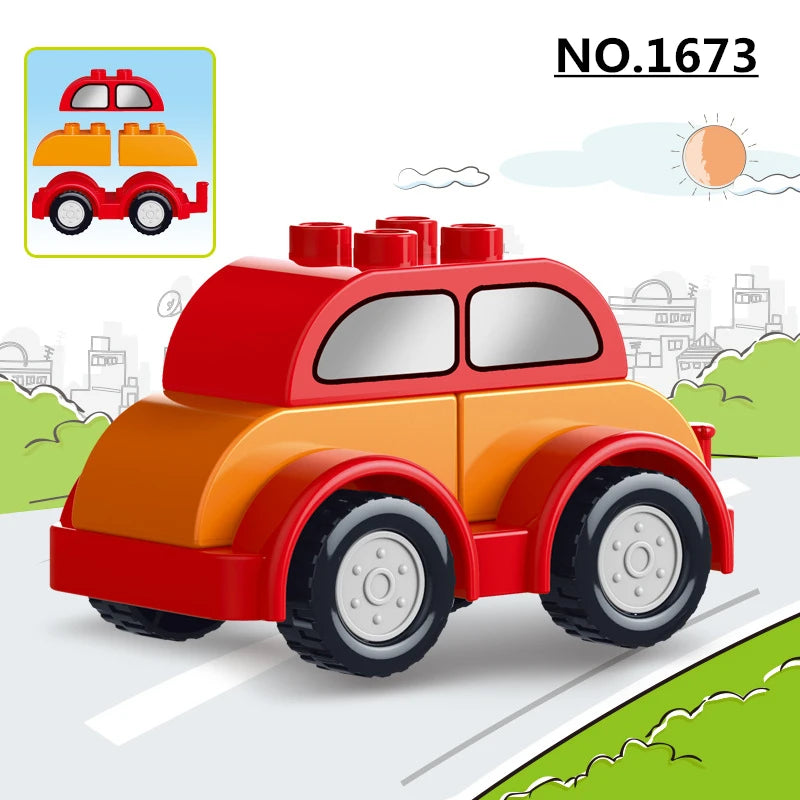 A red and orange construction vehicle building block set with large wheels is shown on a green landscape.