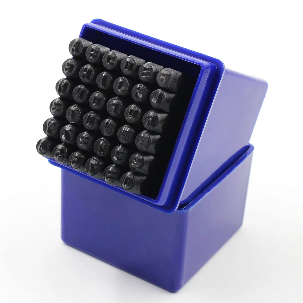 A blue box containing a 36-piece carbon steel number and letter stamping set.