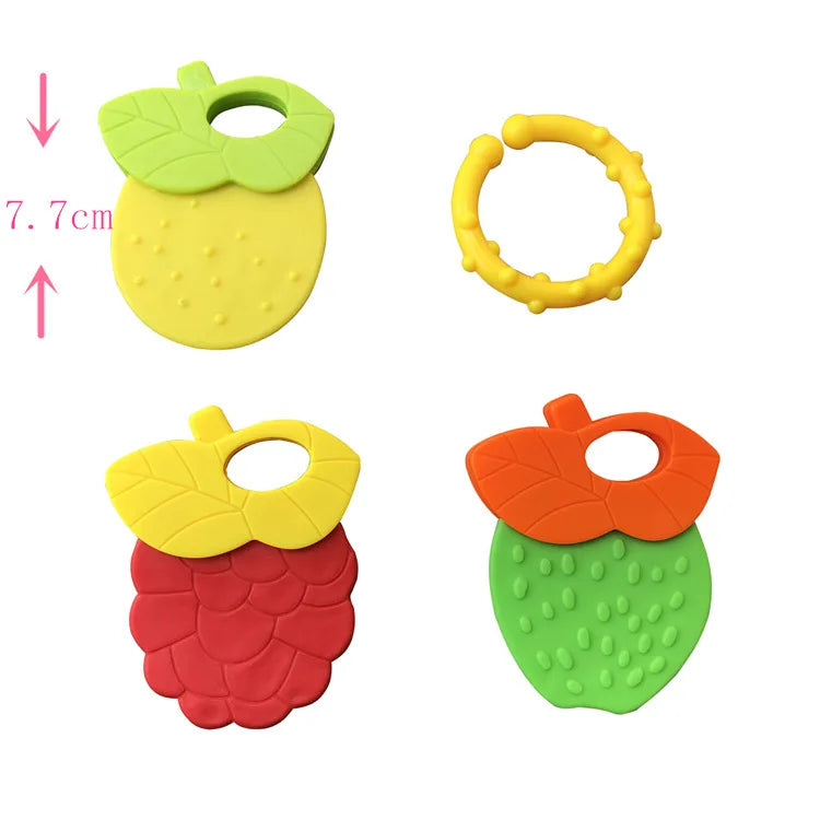 A set of silicone baby teethers shaped like a lemon and a strawberry, yellow and orange colors.
