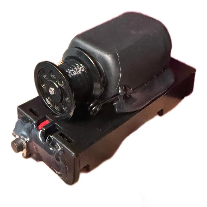 A black professional floating can magic trick device with a lens and mounting plate.