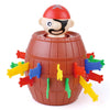 A pirate barrel game featuring a head and various colored plastic sword-like pieces.
