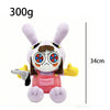 A purple plush doll resembling a character from The Amazing Digital Circus, holding a gun-like accessory.