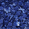 A close-up of deep blue and purple acrylic beads shaped like roses, leaves, and butterflies for jewelry making.