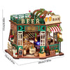A wooden miniature tavern display featuring a bar, greenery, and furniture with integrated LED lights.