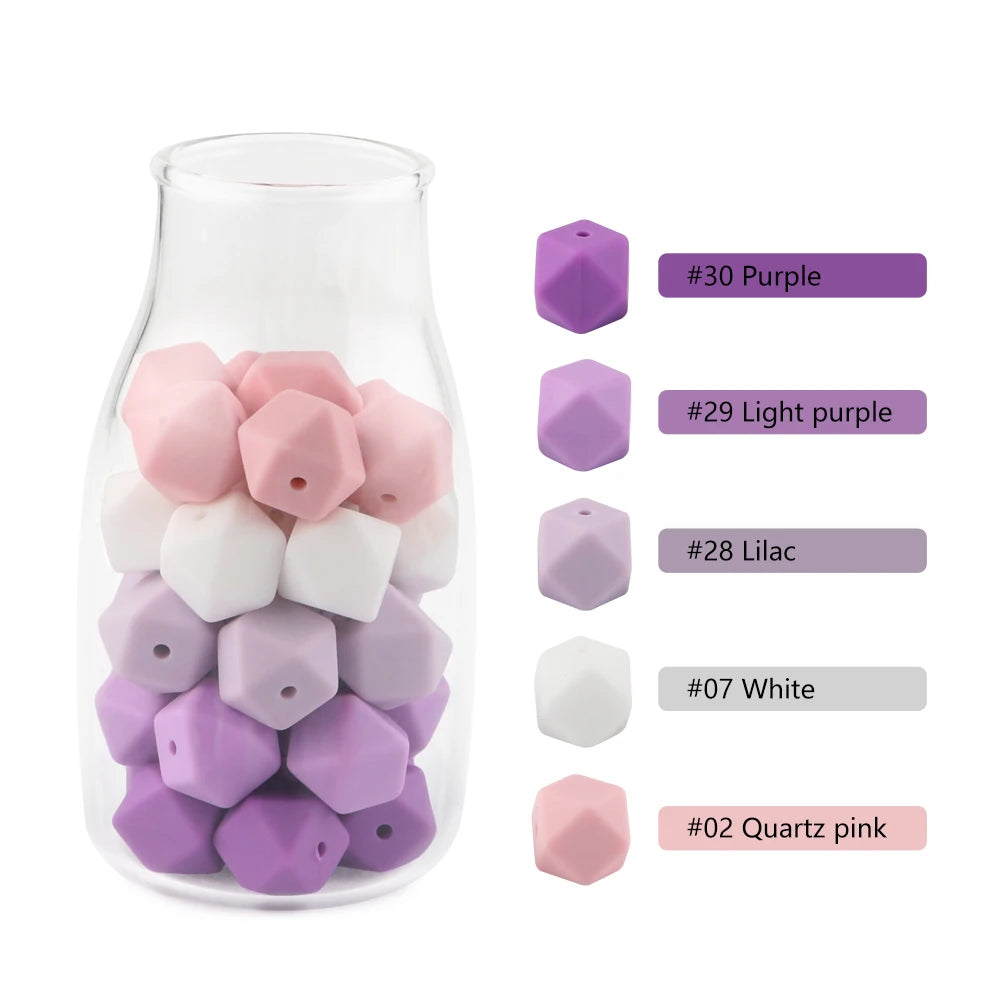 A clear glass jar filled with various hexagonal silicone beads in purple, pink, and white colors.