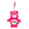Pink Care Bears plush keychain charm with a rainbow design