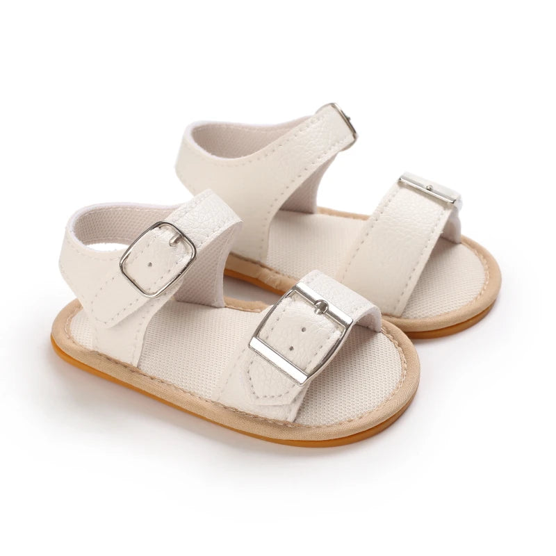 Pair of light beige breathable baby first walker sandals with soft anti-slip soles