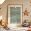 A framed canvas wall art depicting a soccer field with a goal, featuring green and gray stripes.