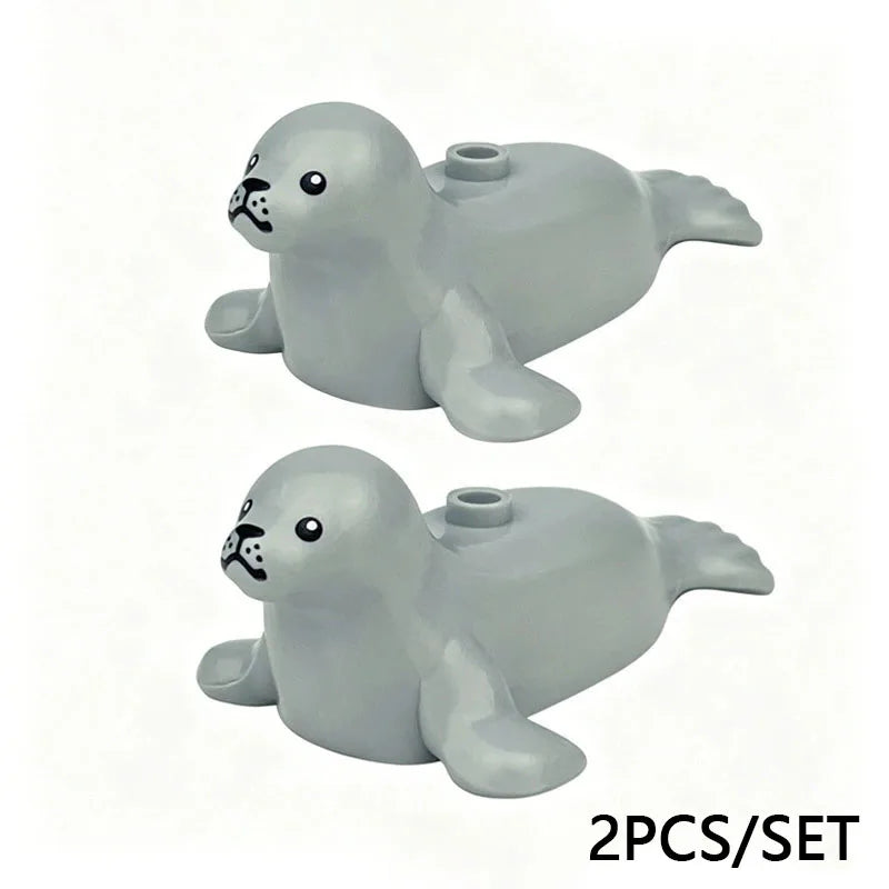 Two gray marine animal building blocks set featuring a shark and an octopus.