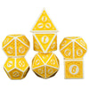 A set of yellow polyhedral dice including a tetrahedron, octahedron, and dodecahedron.