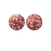 A pair of round, reddish-orange silicone beads with a pattern resembling dried leaves or petals.