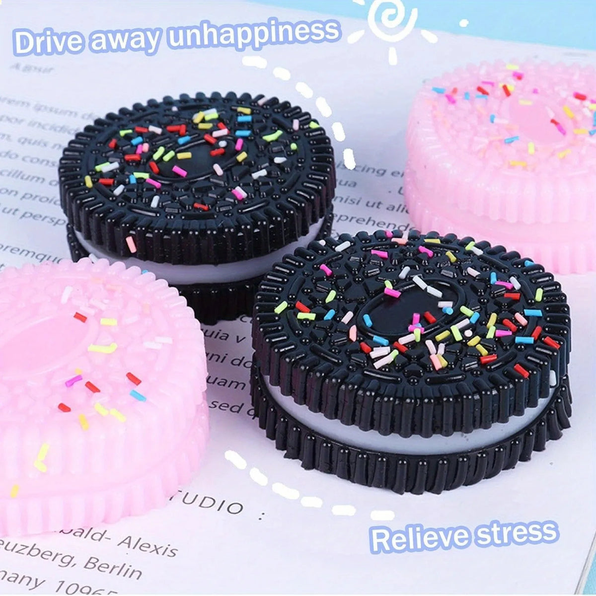 Black and pink squishy stress relief toys with colorful confetti sprinkles