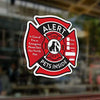 A red and black window decal featuring an alert sign for pets inside in case of fire or emergency.