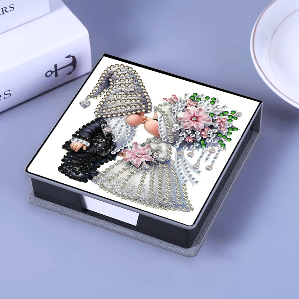 A leather diamond painting kit box featuring a detailed illustration of a baby dressed in elaborate, sparkling attire.