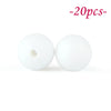 Two white soft silicone beads are shown against a white background.