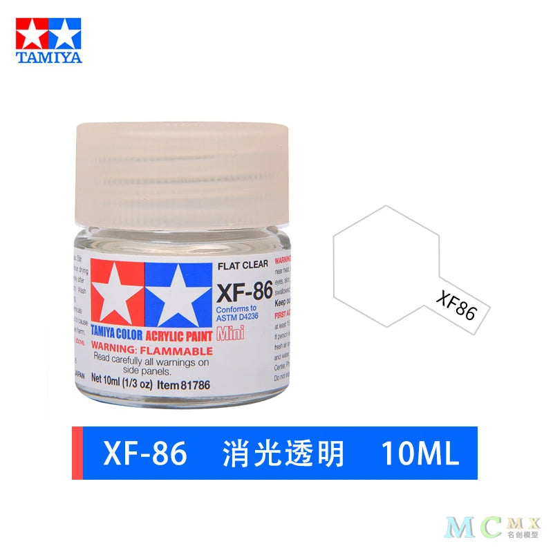 A bottle of XF-86 clear acrylic paint, 10ml, with a pink cap and a white label.