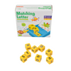 Box of Matching Letter game with yellow dice showing letters A, E, O, G, S, I, N