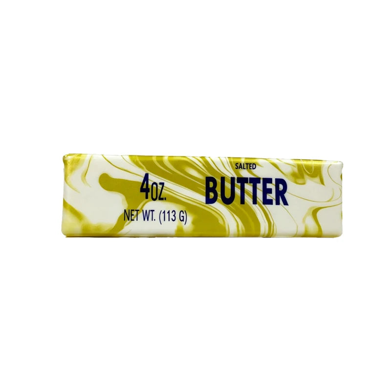 A rectangular bar of salted butter squishy stress relief toy with yellow and white marbled coloring.