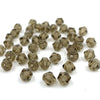 A pile of faceted bicone crystal glass beads for jewelry making