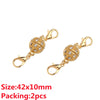 A pair of gold-colored magnetic clasps for jewelry making, featuring decorative textured metal connectors.