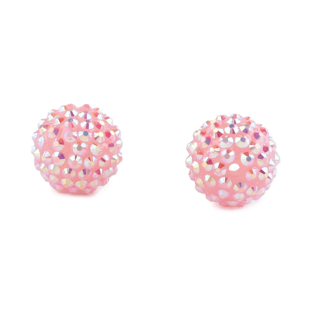 Pink resin ball beads covered in sparkling rhinestones for jewelry making