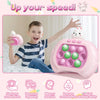 A boy is playing a pink Pop It fidget game console with a white character on his hand.