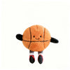 An orange plush sports ball with black accents and feet, resembling a mini basketball or soccer ball.