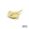 A yellow plastic ocean animal building block with a textured surface and small blue dots.