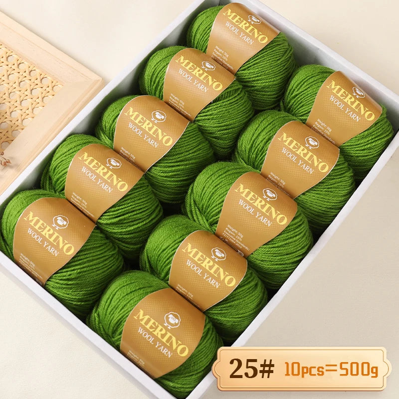 Box of 10 balls of green Merino wool yarn for knitting, labeled as 25#