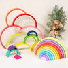 A set of colorful rainbow arch stack blocks for Montessori play