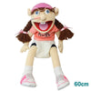 A realistic plush hand puppet with pink hair and glasses, wearing a pink shirt and white shorts.