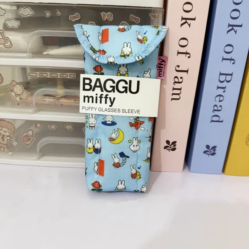 A blue soft cotton storage bag for Miffy magnetic glasses, featuring small white bunny illustrations.