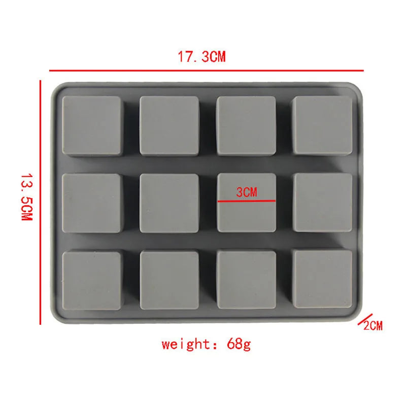 A gray silicone soap mold with 12 square cavities, showing its dimensions and weight.