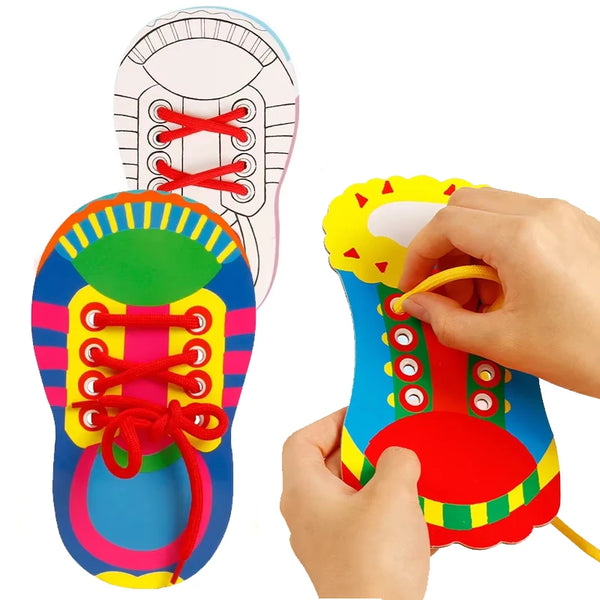 A hand is threading a red shoelace through the eyelets of a colorful plastic shoe for a toddler activity kit.