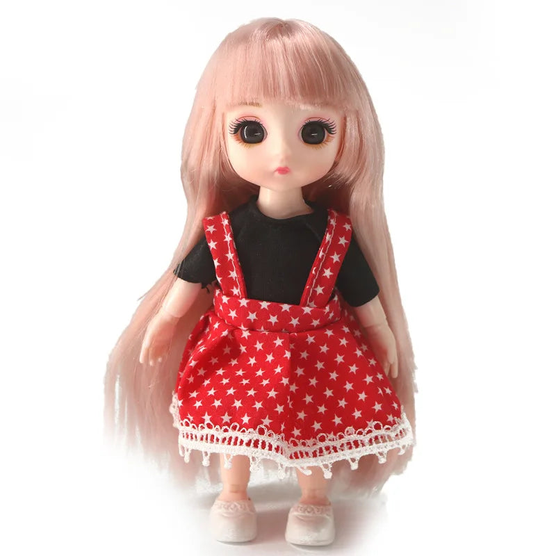A pink Articulated Ball-Jointed Doll princess with black and red outfit