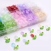 A clear plastic box filled with various colored gradient glass beads for jewelry making