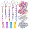 A collection of heart-shaped DIY beaded keychain kits featuring various letter charms in multiple colors.