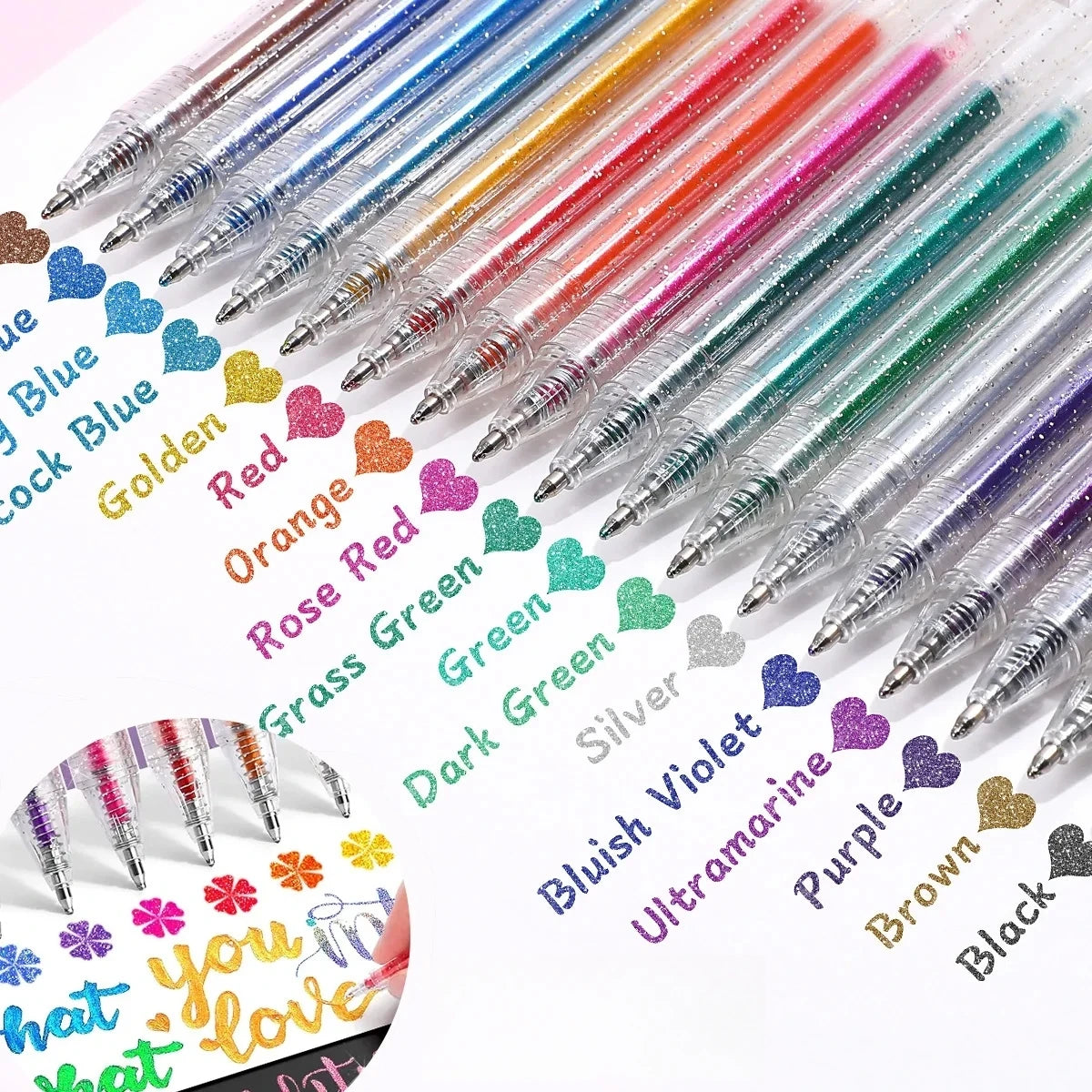 A collection of glitter gel pens in various colors including blue, gold, red, pink, green, and purple.