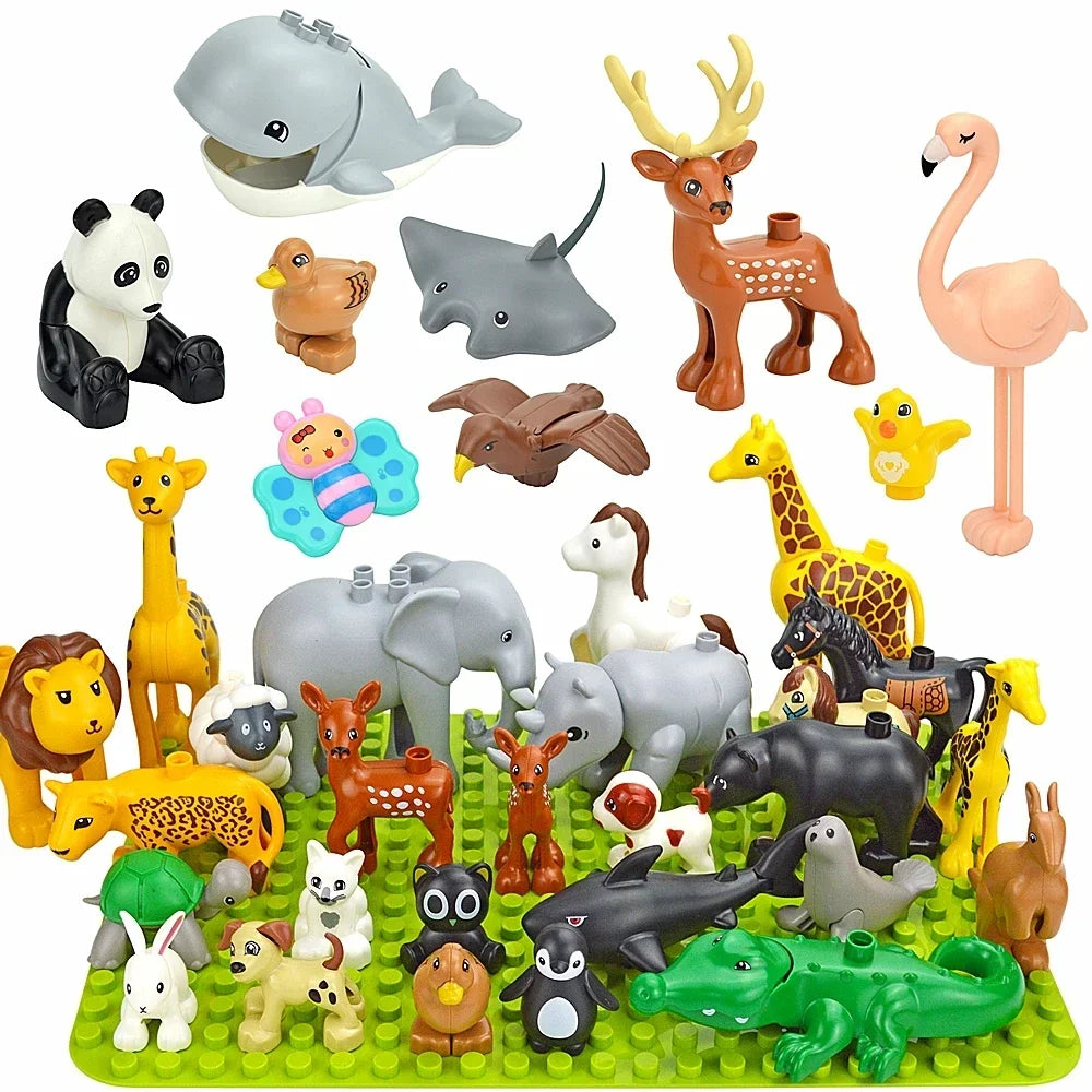 A collection of various zoo animal building blocks made of plastic in natural and earthy tones.