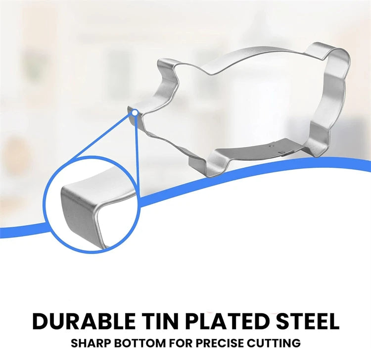 A close-up view of a tin-plated steel pig-shaped cookie cutter for precise cutting.