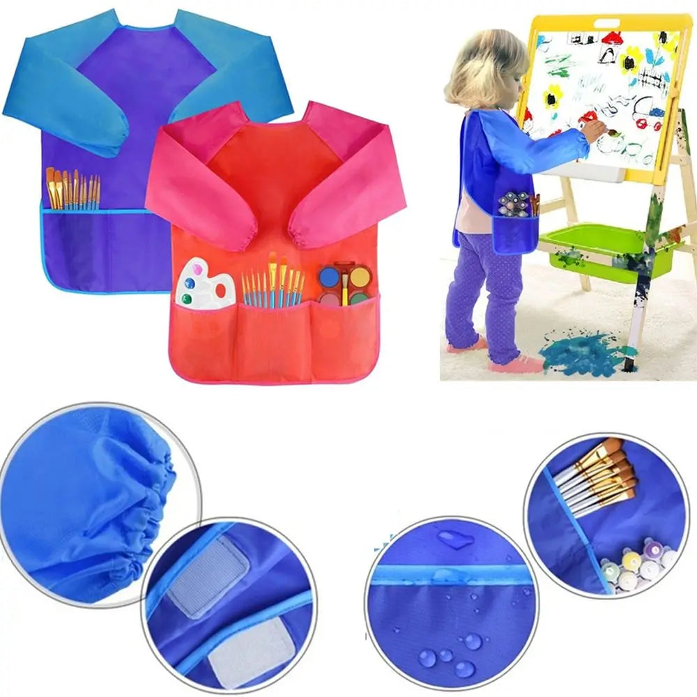 A bright pink and orange waterproof kids art and baking apron with long sleeves shown on a child.
