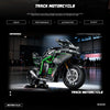 A black and green track motorcycle model is displayed on a dark surface with a blurred background.